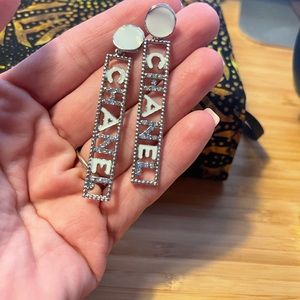 C C dangle earrings.